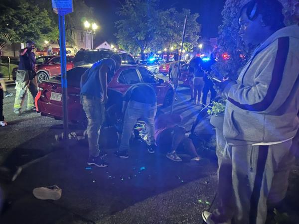 Victims lie on the ground as police respond to a deadly mass shooting where many were also wounded outside a nightclub in Birmingham, Alabama, U.S., September 21, 2024.
