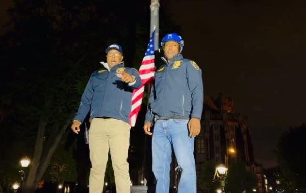 Cops including two high-ranking NYPD officials proudly hoisted an American flag after evicting protesters encamped at City College on Tuesday, April 30, 2024. (@NYPDDaughtry / X)