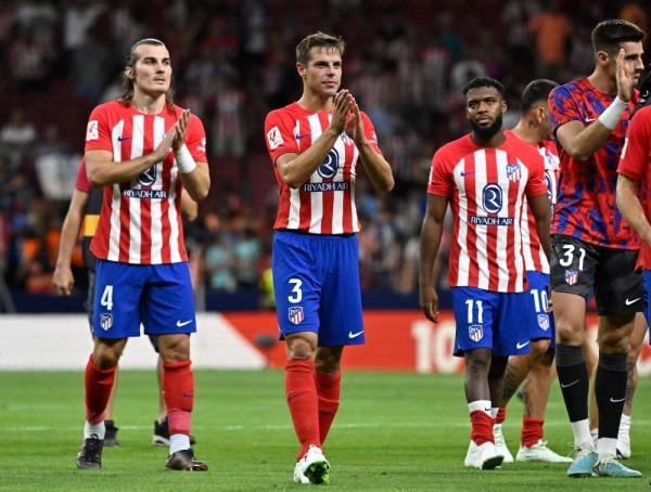 Atletico hit three to take early Liga lead