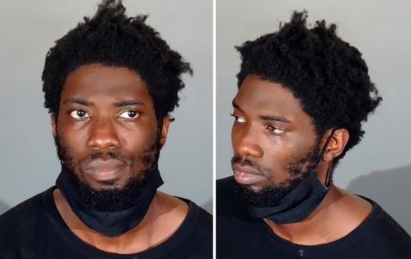 These undated photos provided by the Los Angeles Police Department shows shows 31-year-old Shawn Laval Smith